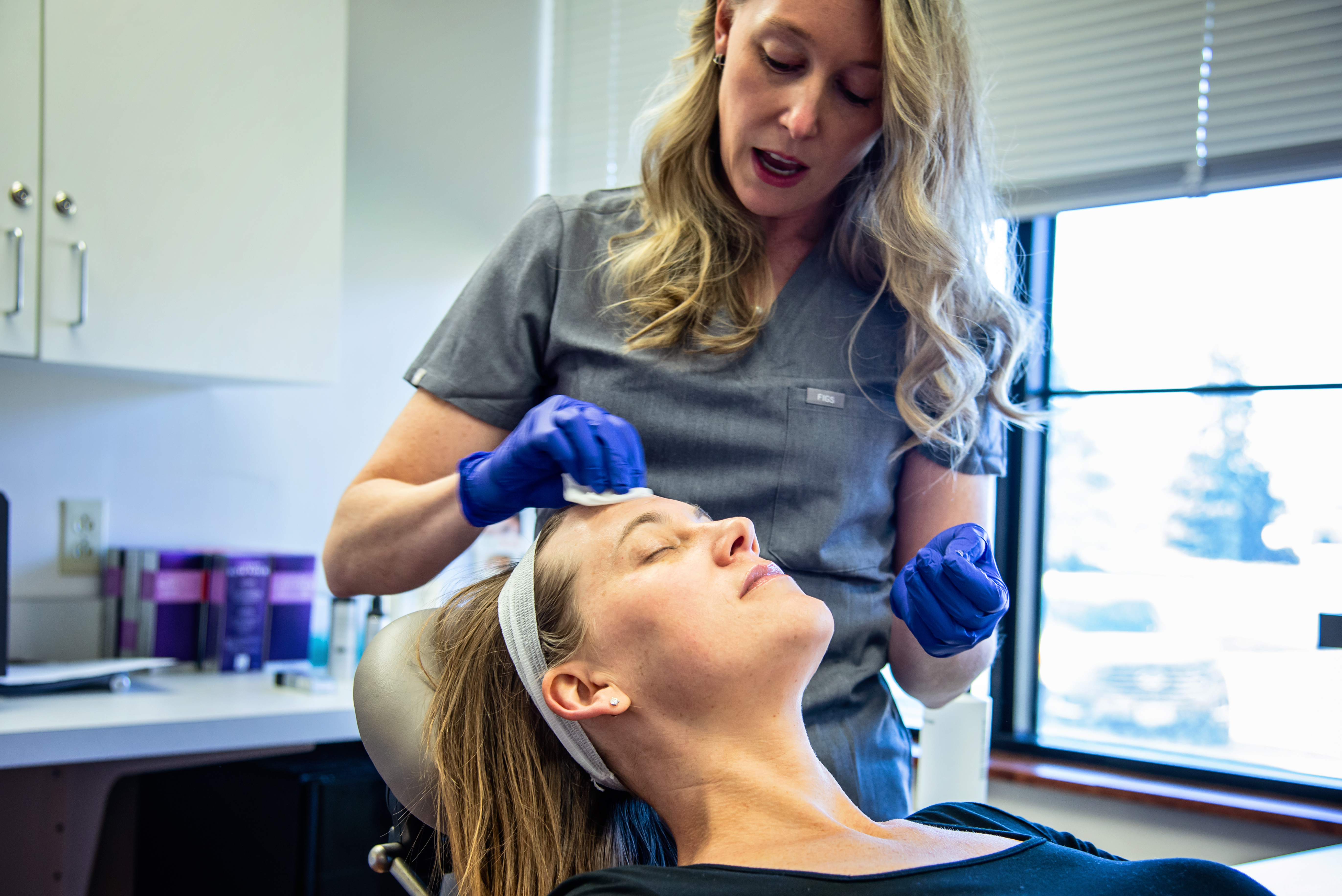 Professional skin care treatment in progress